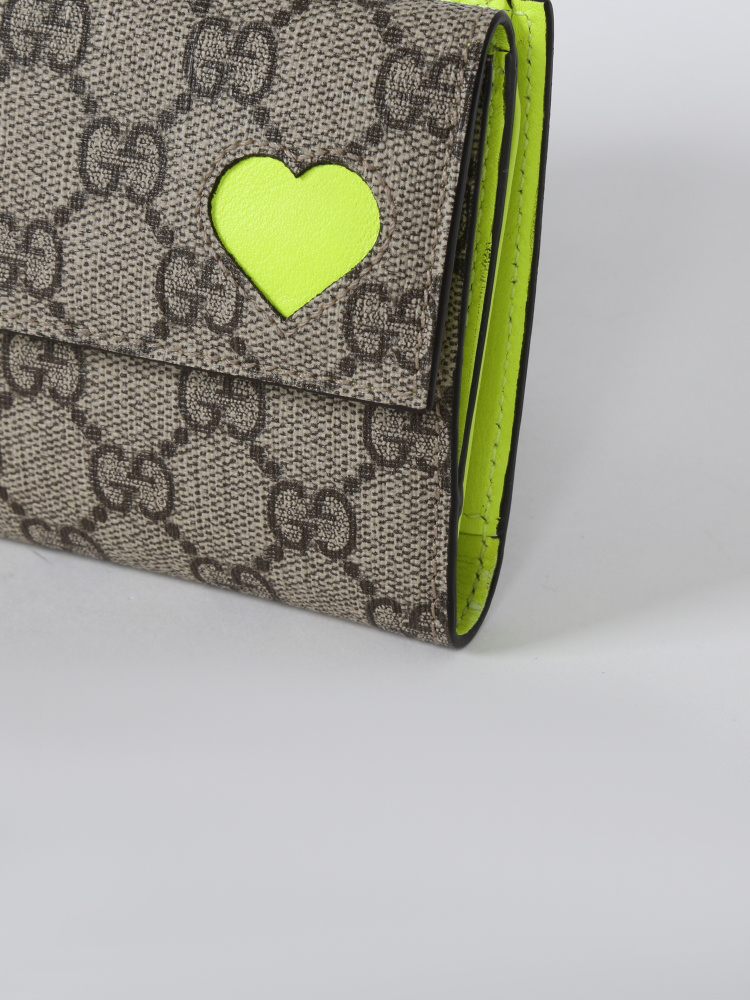 Authentic Gucci Metallic Guccissima Heart Travel Wallet – The Neon Gypsy  Shopping