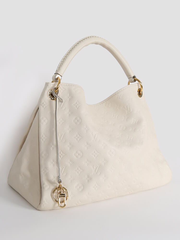 Louis Vuitton Neige Monogram Empreinte Leather Artsy MM Bag at 1stDibs