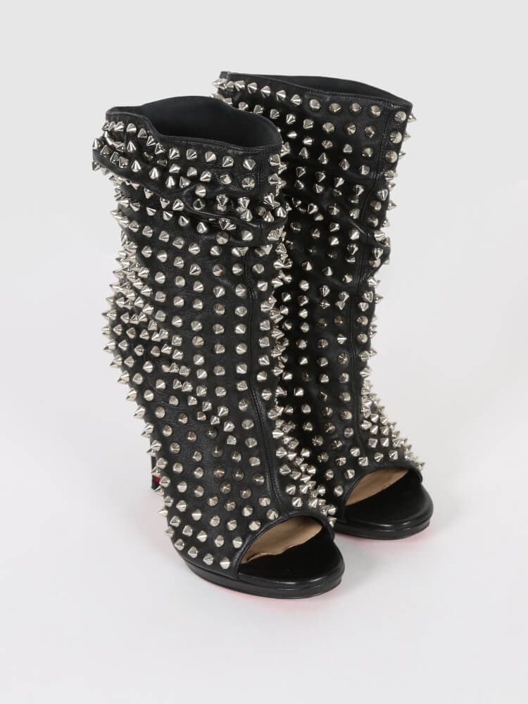 Boots with shop spikes on toe