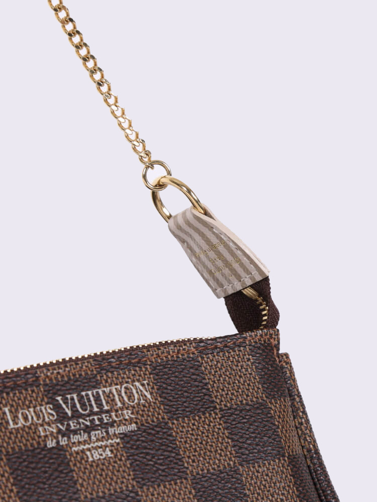 Louis Vuitton Inventeur Trunks & Locks Mini Pochette