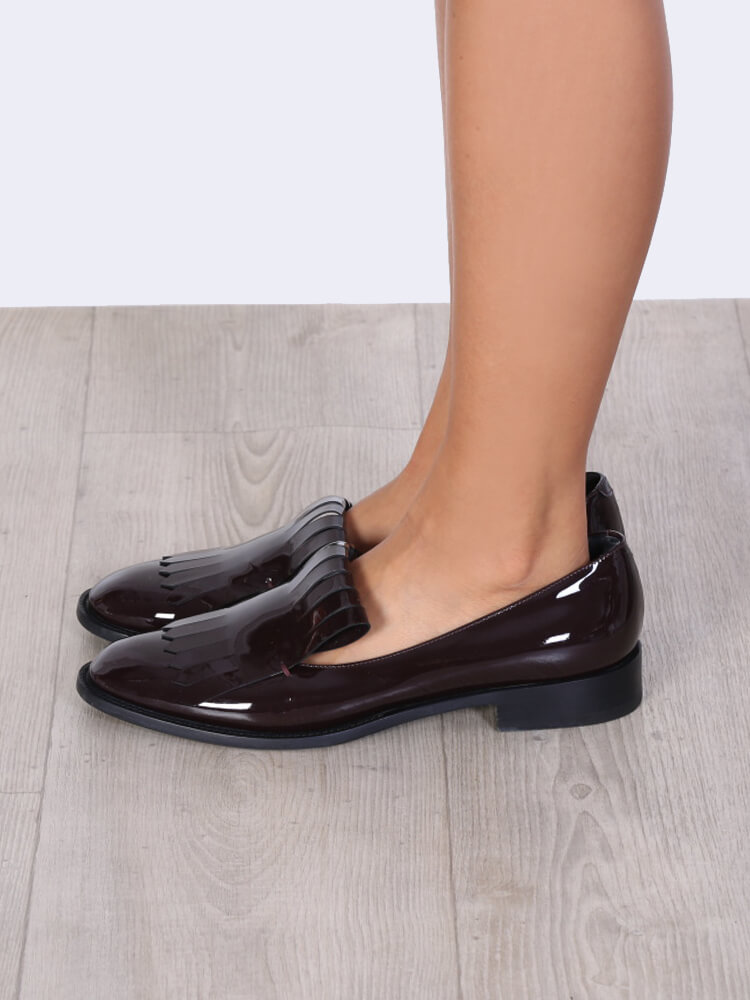 patent fringe loafers