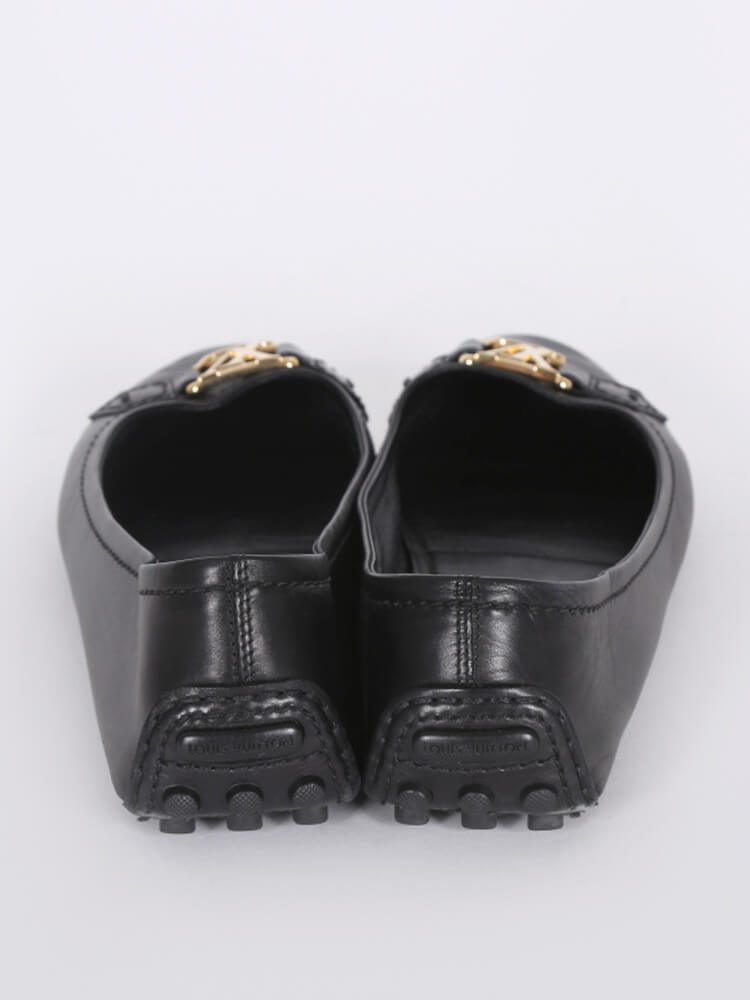 Leather flats Louis Vuitton Black size 12 UK in Leather - 33030693
