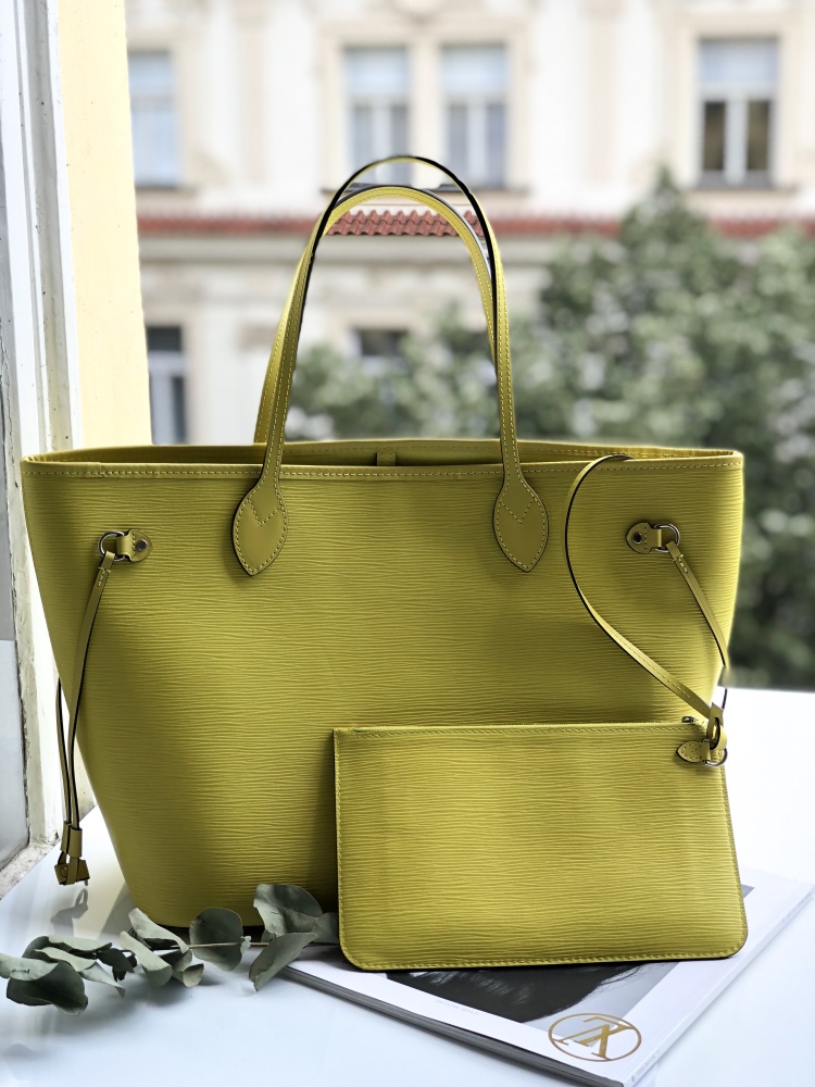 Louis Vuitton EPI Leather Neverfull Pochette MM – Caroline's Fashion  Luxuries