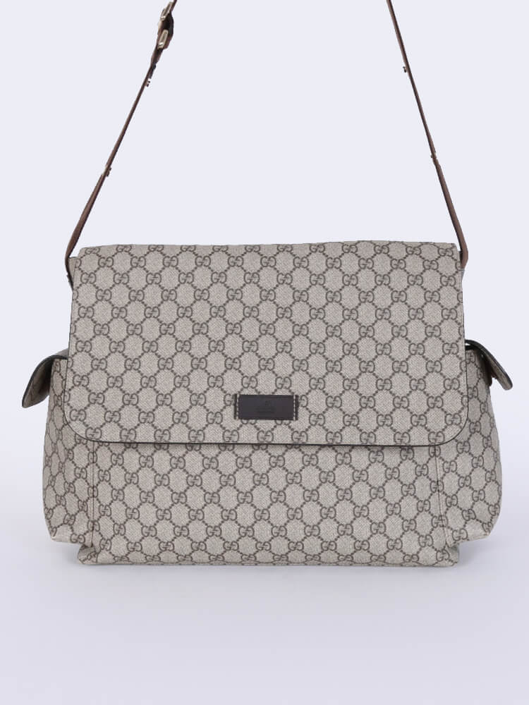 Gucci supreme deals diaper bag