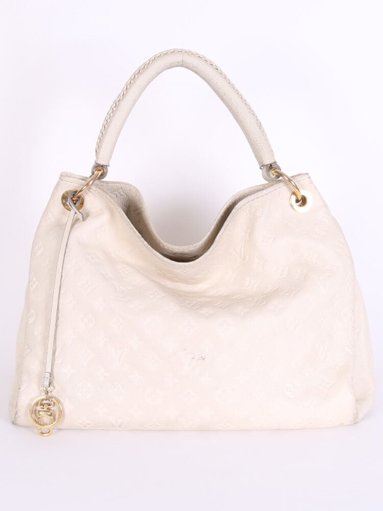 Louis Vuitton Neige Monogram Empreinte Leather Artsy MM Bag at 1stDibs