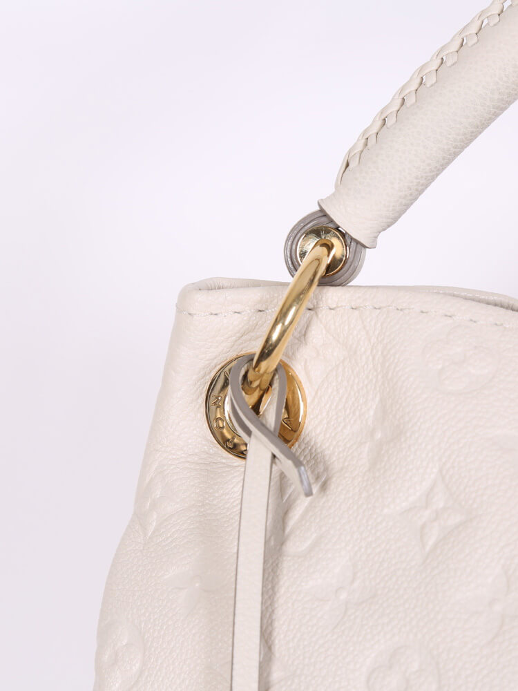 Louis Vuitton Neige Monogram Empreinte Leather Artsy MM Bag at 1stDibs