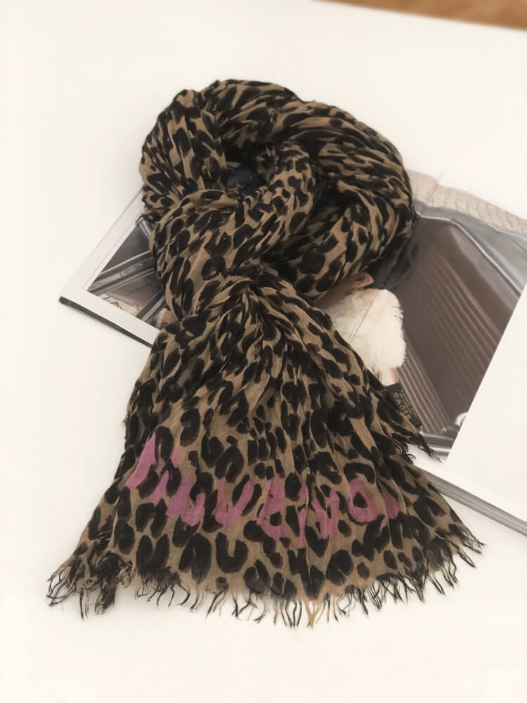 Louis Vuitton Silk Animal Print Scarf in Brown