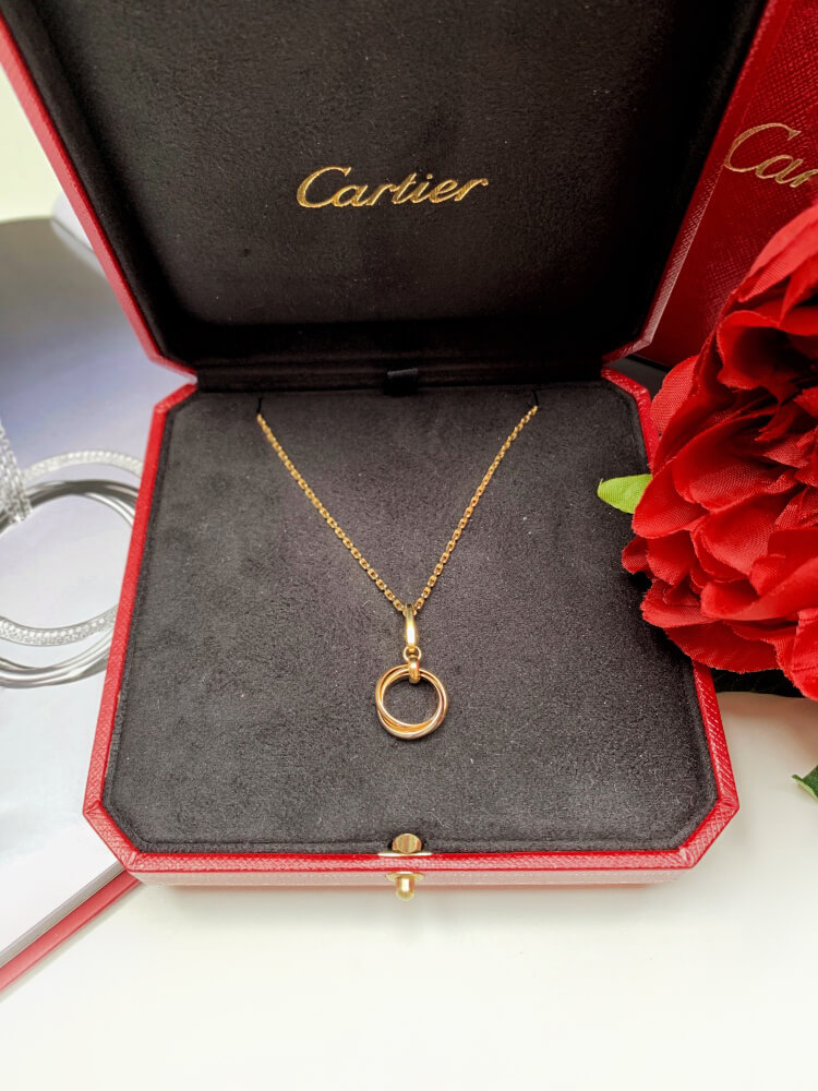 Cartier Trinity 18kt Gold Charm Pendant Necklace www.luxurybags.eu