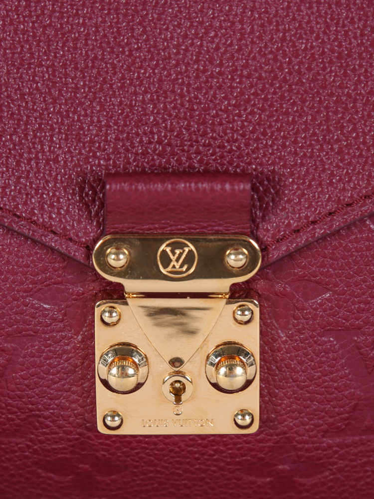 Louis Vuitton Aurore Leather Monogram Empreinte Mini Pochette 43lu714s at  1stDibs