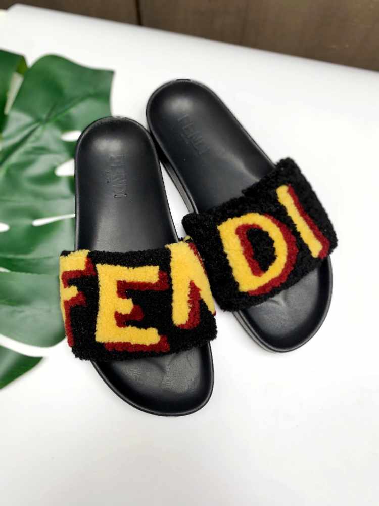 black and yellow fendi slides